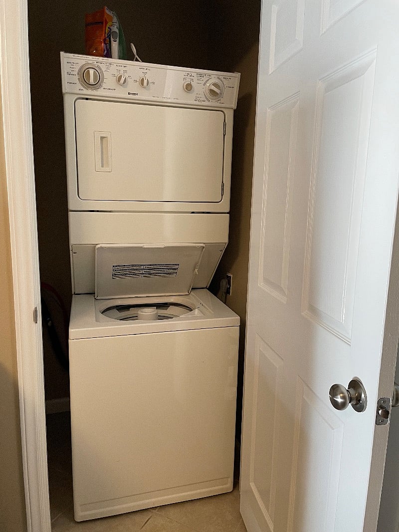 Stackable washer/dryer off kitchen