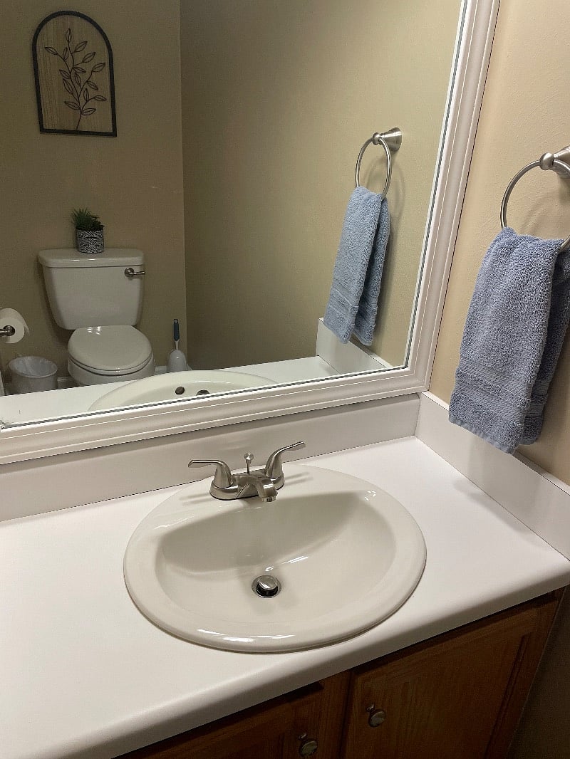 1/2 bath downstairs off kitchen and living room.