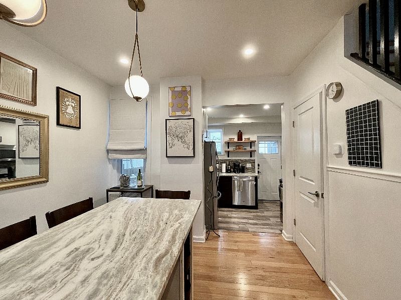 Dining room with island facing the kitchen