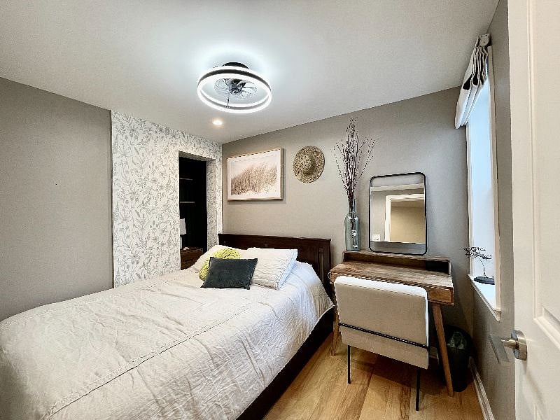 Guest bedroom with nook storage and desk