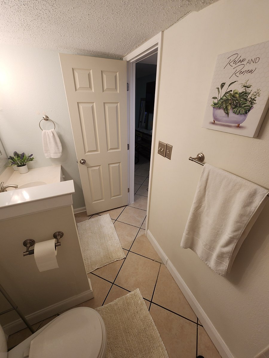 Newly Remodeled & decorated Bathroom with large vanity space for getting ready. 