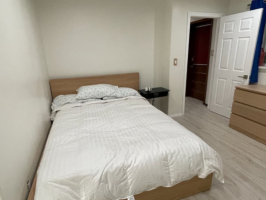 Queen bed with down comforter