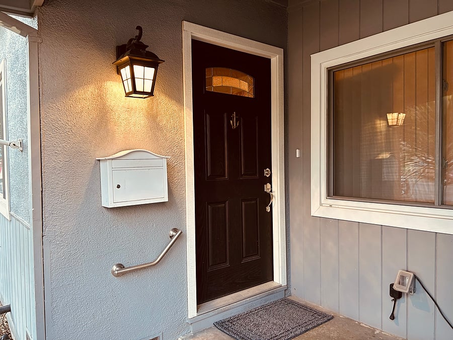 Front door under covered porch.