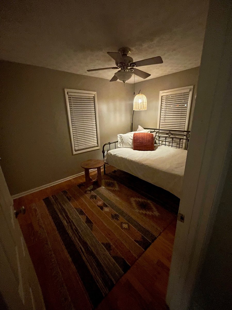 Bohemian bedroom with full sized daybed. 