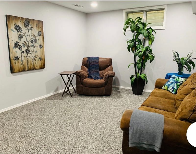 Family room downstairs with door
