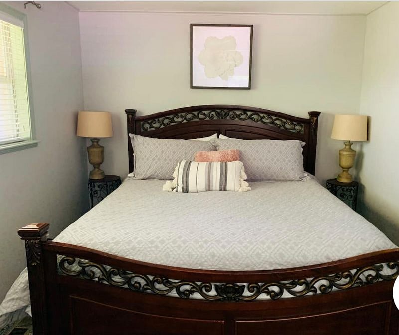 King bedroom upstairs - has lake view from windows