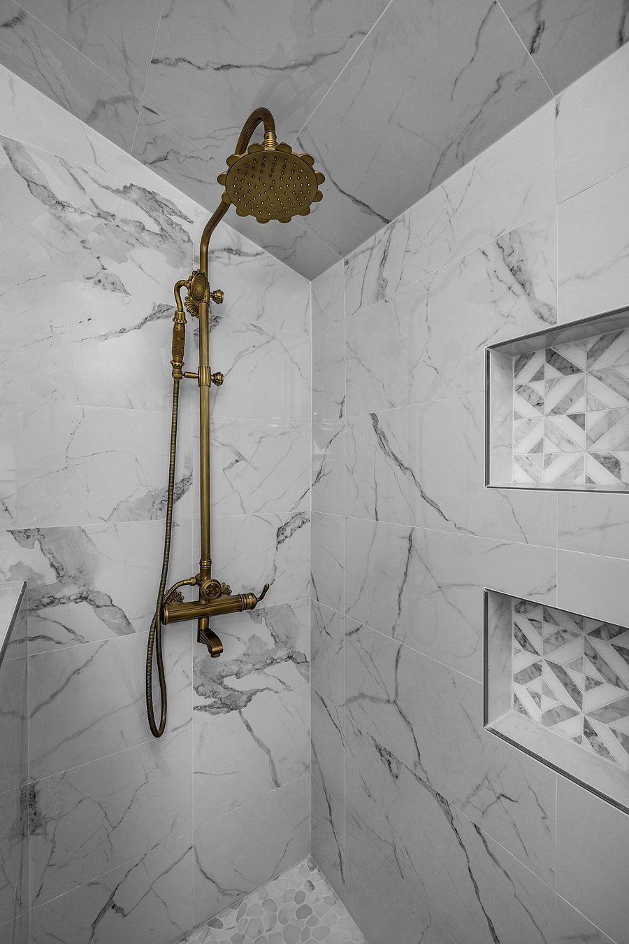 Marble bathroom with walk-in shower, rain can shower head, swinging glass door (nearly 180 swing: 90 inward and outward), antique brass fixtures