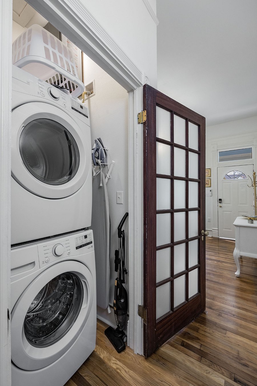 private laundry closet with washer/dryer (located in hallway)