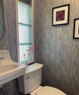 We call this powder room bath the "tiny bath" for a reason.
It is available for any of our guests and can be very convenient if the shared bath is occupied.