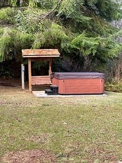 Enjoy a soak in our hot tub in very private back yard surrounded by tall trees.
It is always available and ready for your soak!