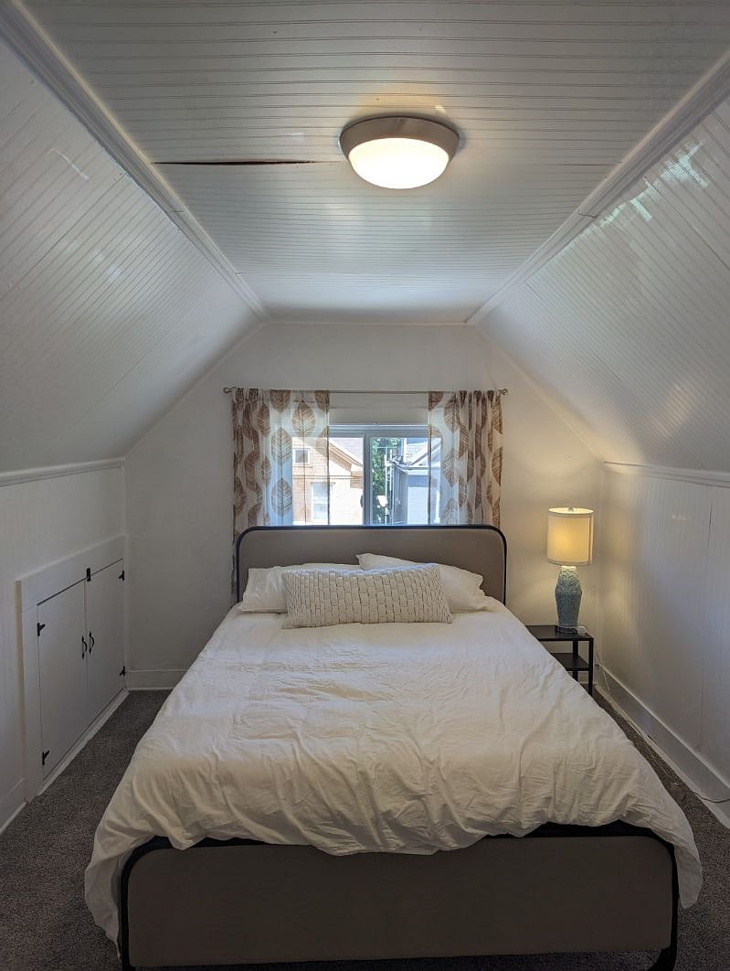 Clean and crisp third floor bedroom.
