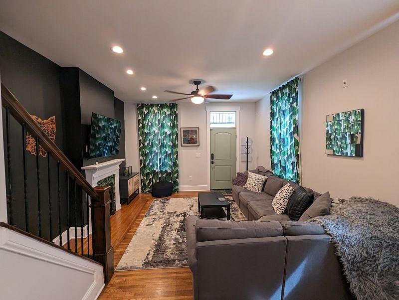 Oversize sectional with large TV equipped with a Google TV with Chromecast for all your streaming content.
