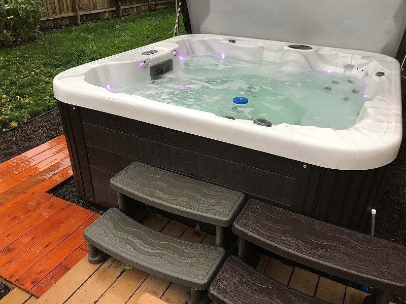Unwind w/ your friends in our 7-person hot tub!