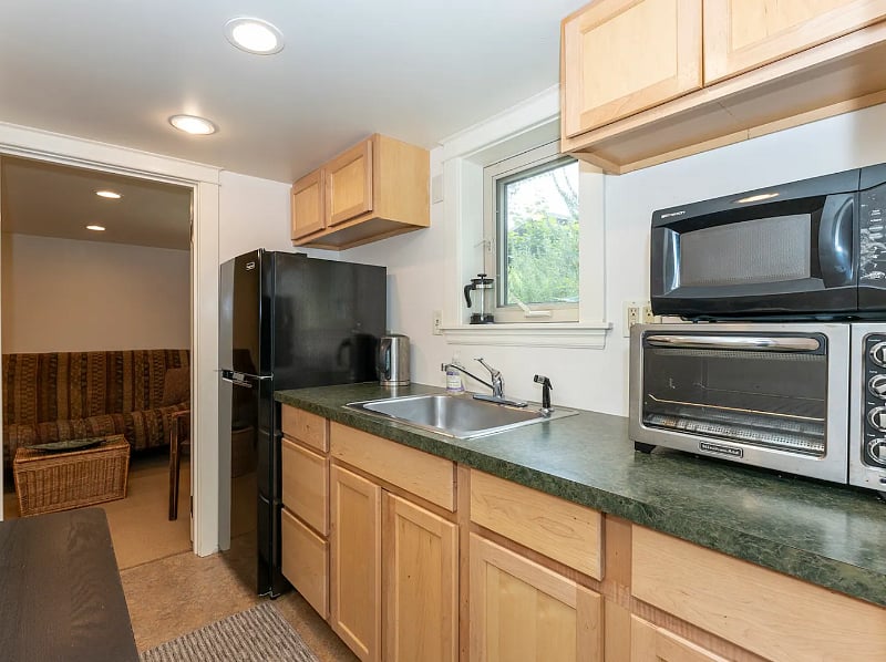 Fully stocked kitchenette. Coffee maker, microwave, toaster oven, hot plate, pots, pans, china, cutlery, spices & more included!