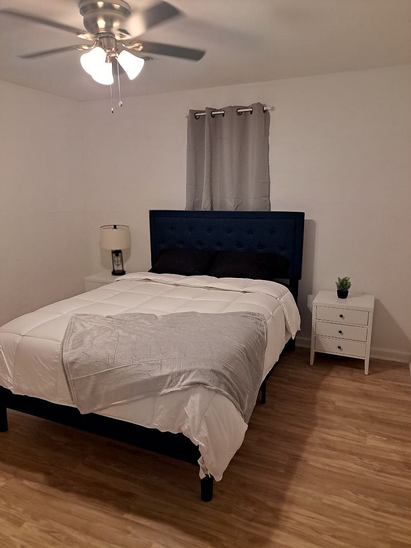 Second bedroom. Full size bed. Dresser and night stands.