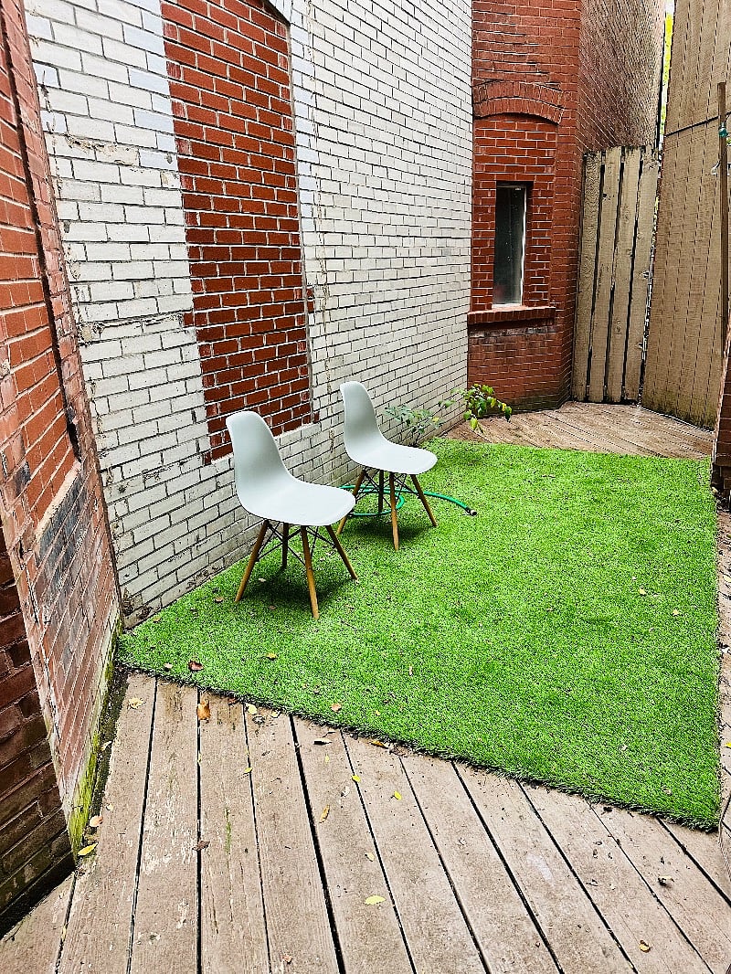 Outdoor sitting area off of bedroom