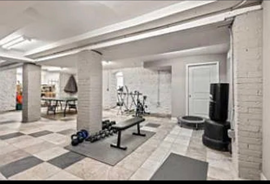 Gym located in the basement of property 
