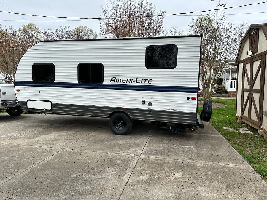 The driveway is shared with this travel trailer.
