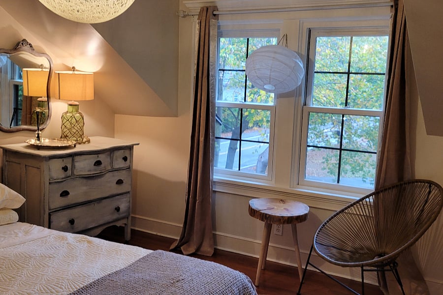 Queen bed, blackout curtains and tv included in the bedroom.