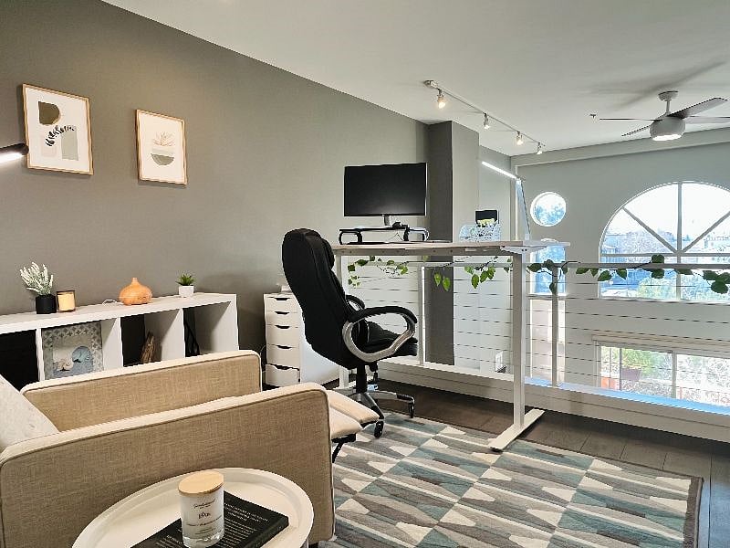 Dedicated workspace with a spacious standing desk and scenic view