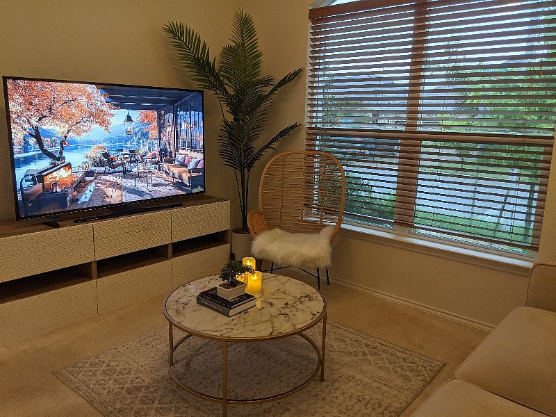 Living room is furnished with a 65 inches Samsung smart TV offering free Netflix and Amazon Prime access.