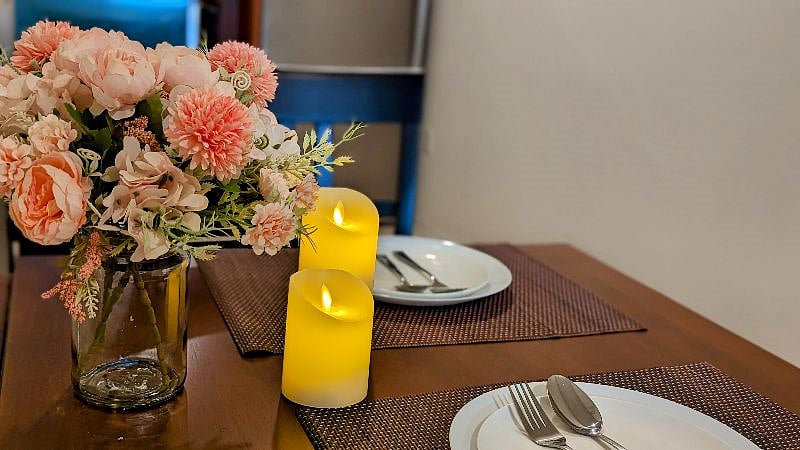 Dining table is good for two but can be extended if necessary.