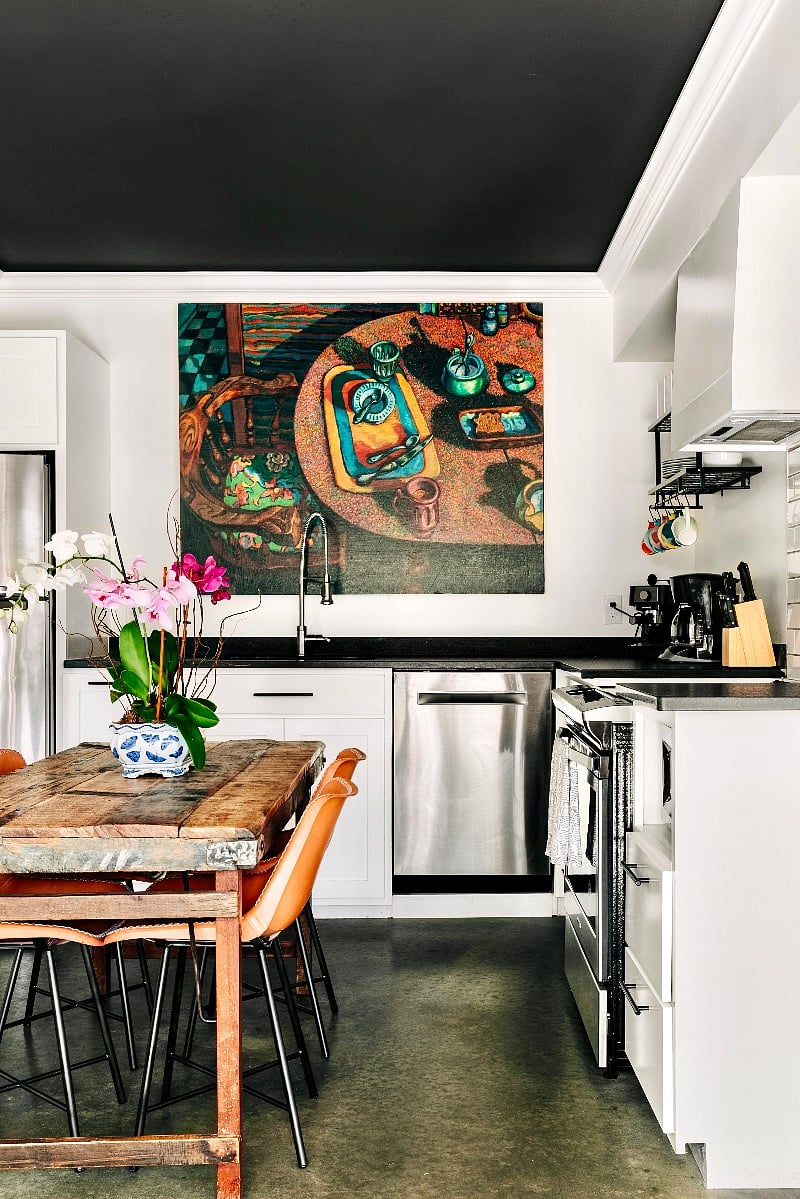 My kitchen has a ceramic top Whirlpool range, dishwasher, disposal, and stainless steel fridge with ice maker. My kitchen also has a knife block, electric tea kettle, espresso and coffee makers, & French press. 
