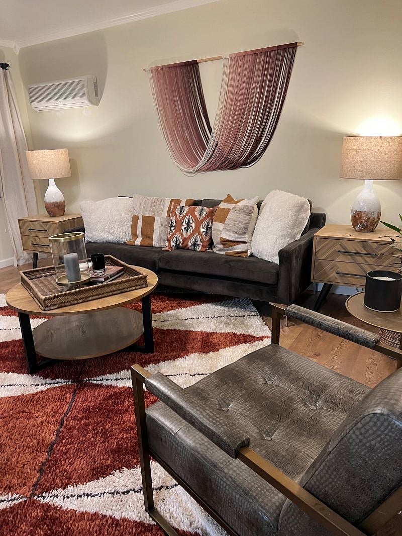 Kitchen and living room are open for spacious feel.