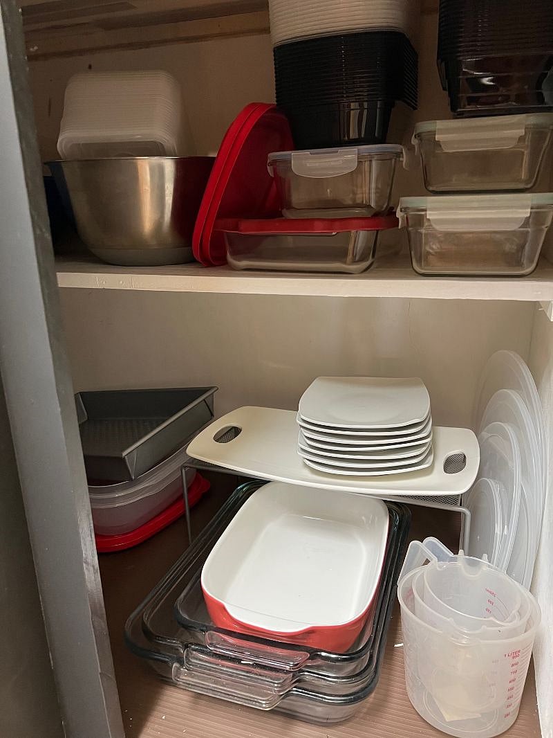 Lots of plates, glassware, storage containers, cooking utensils, supplies, nutriblender, toaster, mixer along with extra batteries, lighters, scissors- all the essentials!