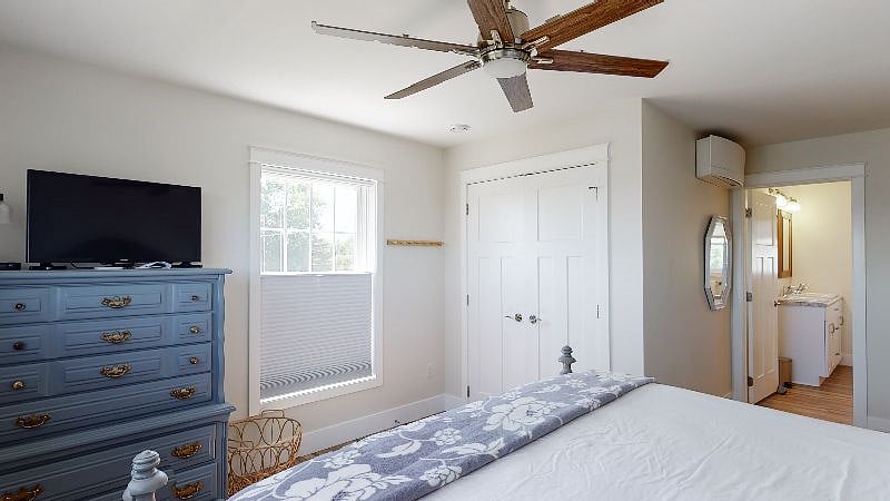 Master bedroom with king size bed and en suite bath.