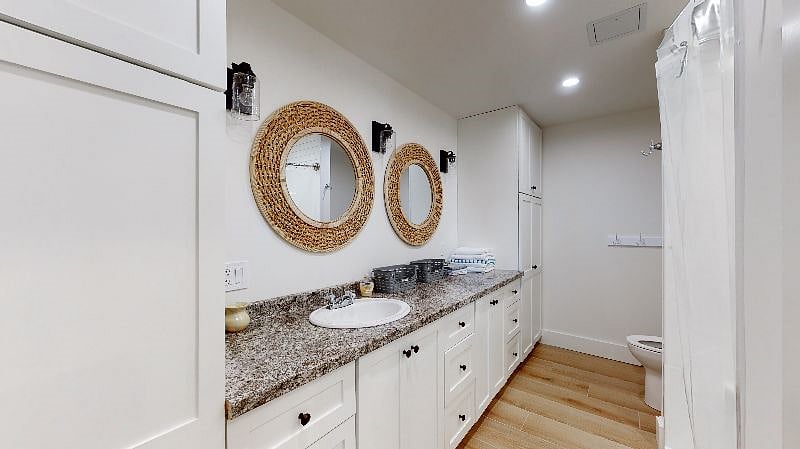 Lower level bathroom with upgraded finishes.