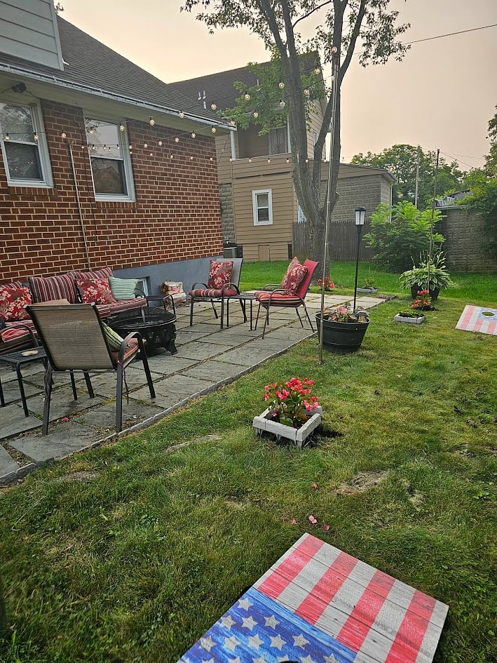 Backyard and patio.  Outside relaxation or a game of cornhole.  Furniture and Weber grill available year round!  