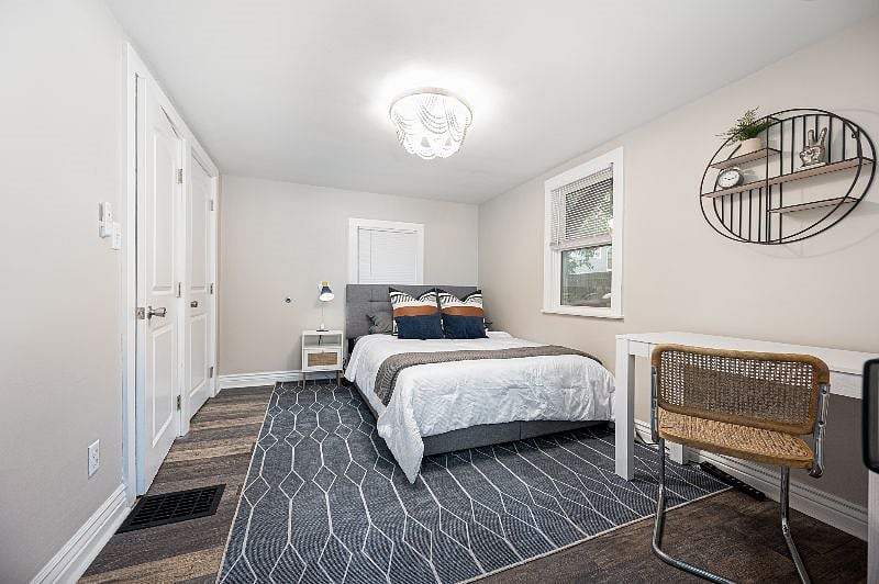 Serene bedroom with a queen bed. Large closet and storage under the bed.
