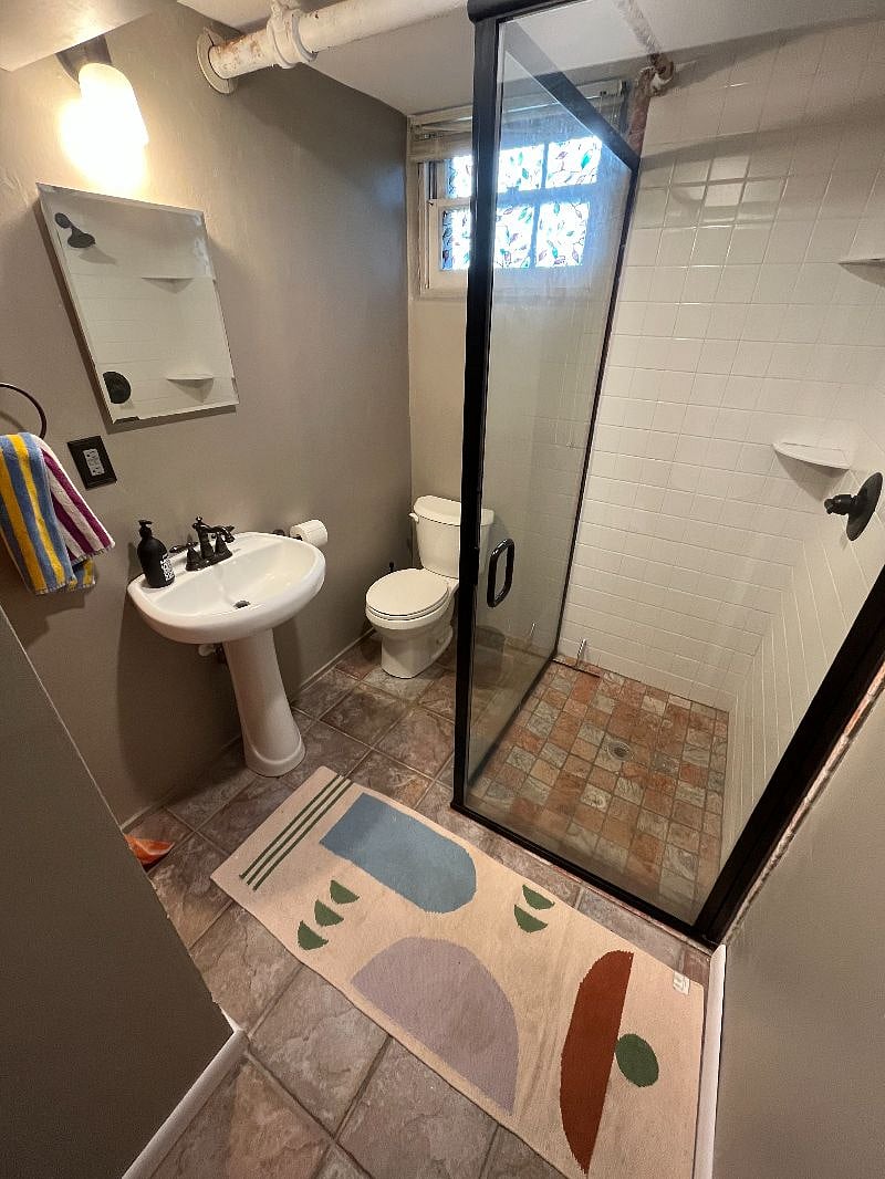 Shower - soap and shampoo/conditioner supplied as well as all bath linens and bath cleaning supplies