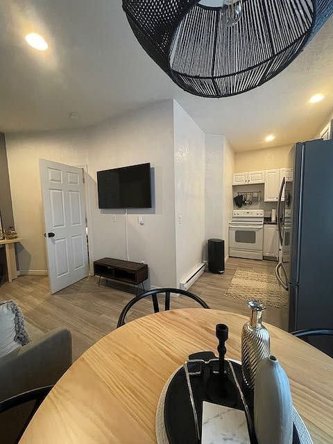 View of kitchen and living from dining