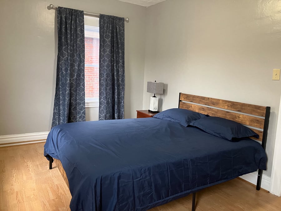 Second bedroom with a queen bed