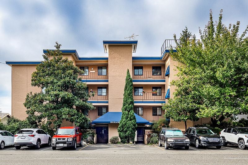 Front of building with additional parking
