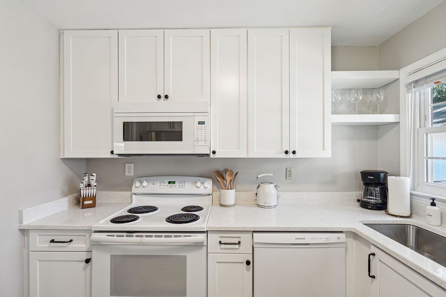 The newly renovated kitchen comes fully stocked with everything you need, including modern appliances. Coffee maker, hot water kettle, and starter coffee, cream and sugar provided!