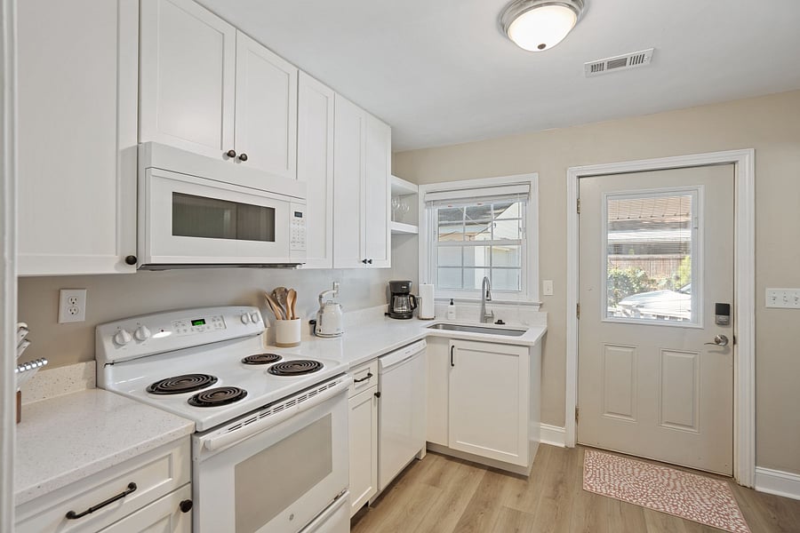 The newly renovated kitchen comes fully stocked with everything you need, including modern appliances. Coffee maker, hot water kettle, and starter coffee, cream and sugar provided!