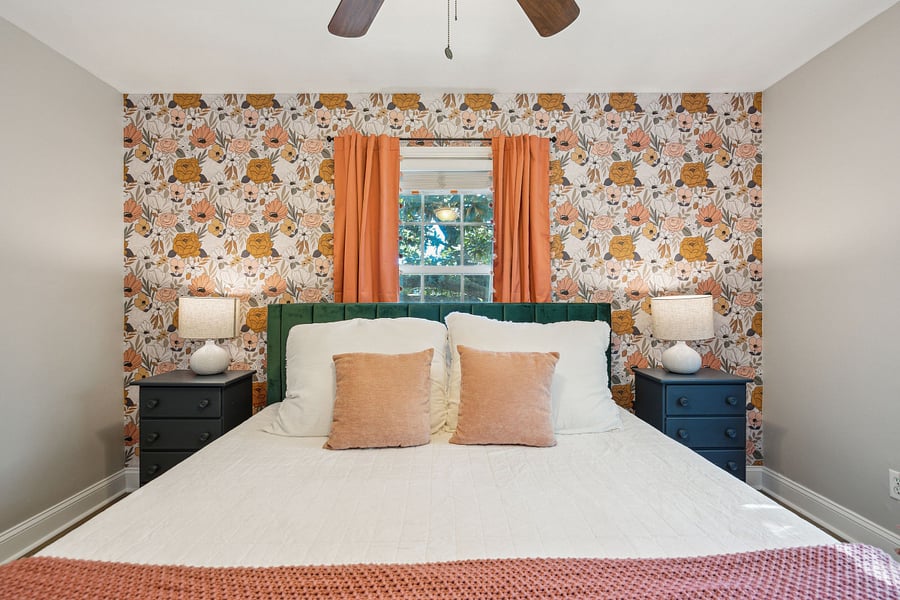 Bedroom #1 features a king bed, small closet, and smart TV. 
