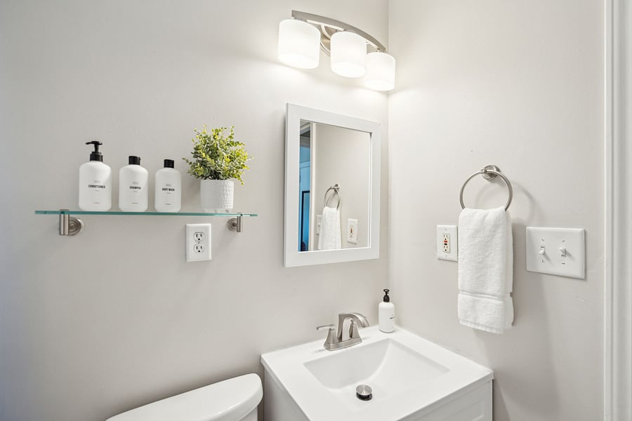 The cottage has one full bathroom with a beautifully tiled shower/tub and modern fixtures.
