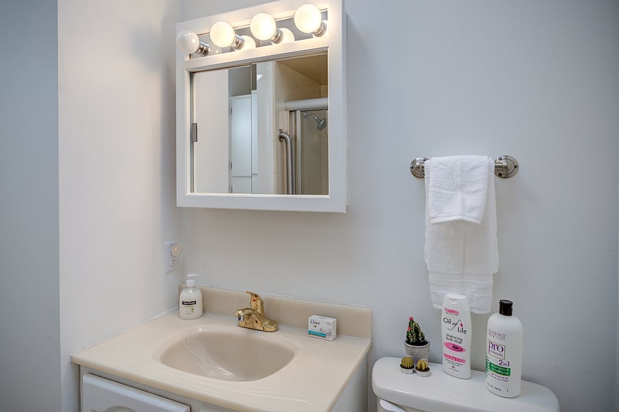 Bathroom with starter toiletries supply. Emergency stash of often-forgotten personal items (toothbrush, comb, nail file etc) also provided. 