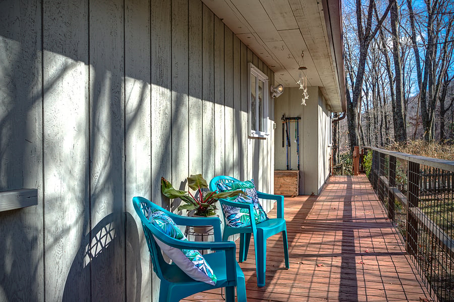 Front porch (view from far end of porch). (Note - outdoor seating is put into storage during snow season, usually Jan-Feb)