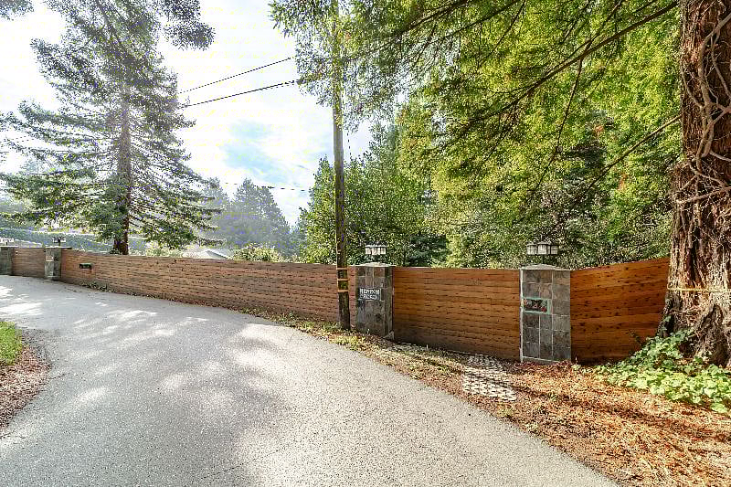 Property fence line along road.