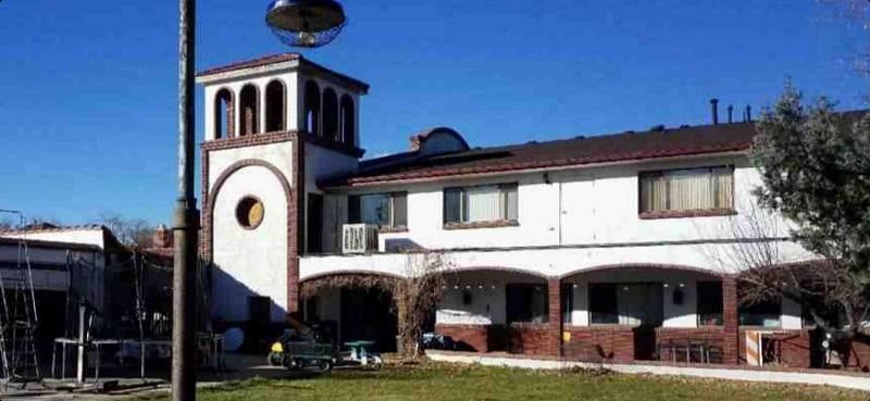 South exterior & Bell tower. East lawn available for tenant use.