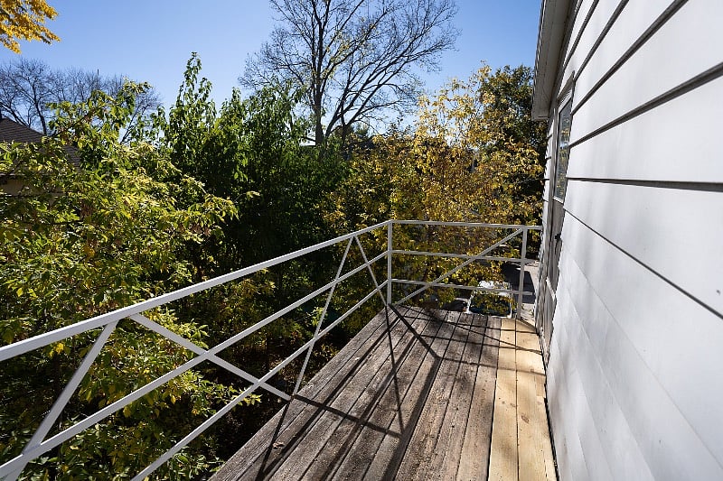 Large deck overlooking backyard