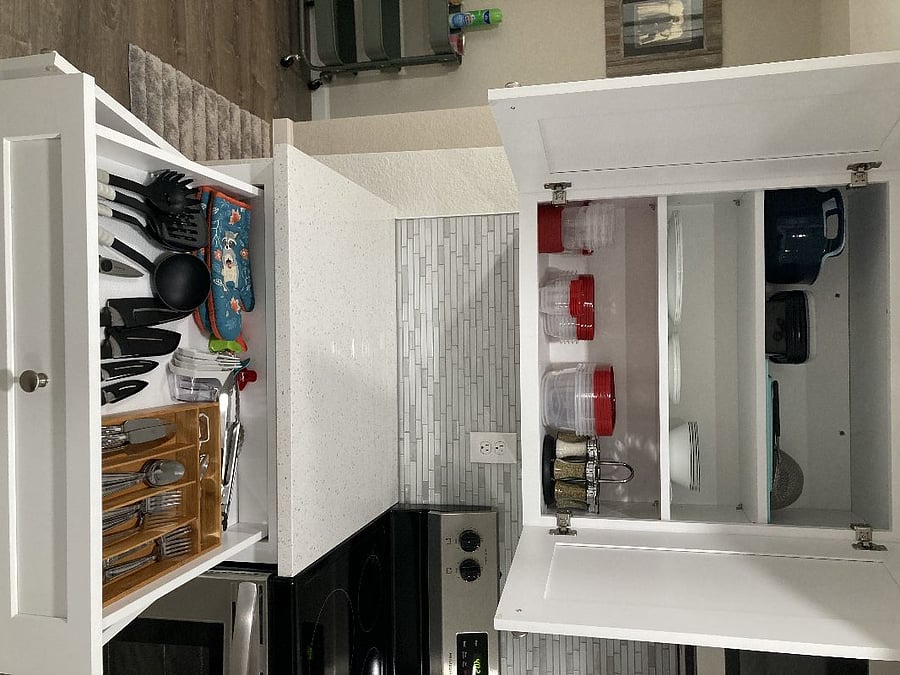 Full stocked kitchen with Tupperware, seasonings, cooking essentials. 