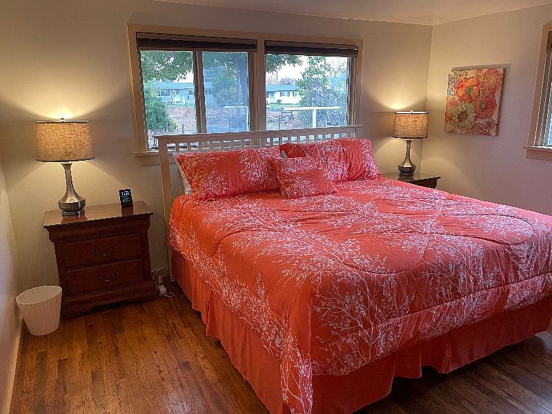 Spacious bedroom with king bed for restful sleep during extended stays.