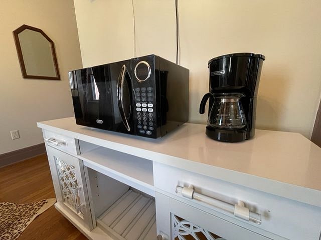 Space includes microwave, mini-fridge and coffee maker.