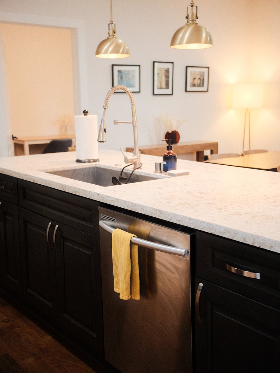 Kitchen has a large sink & dishwasher